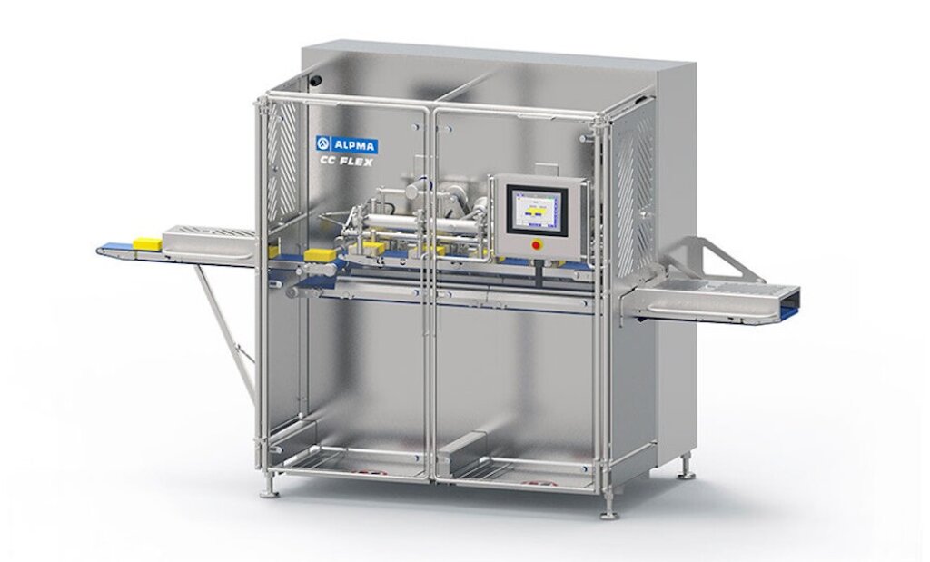 CC Flex Dicer – Industrial cutting machine for dicing cheese slabs, featuring a stainless steel housing, conveyor belt, and integrated control panel.