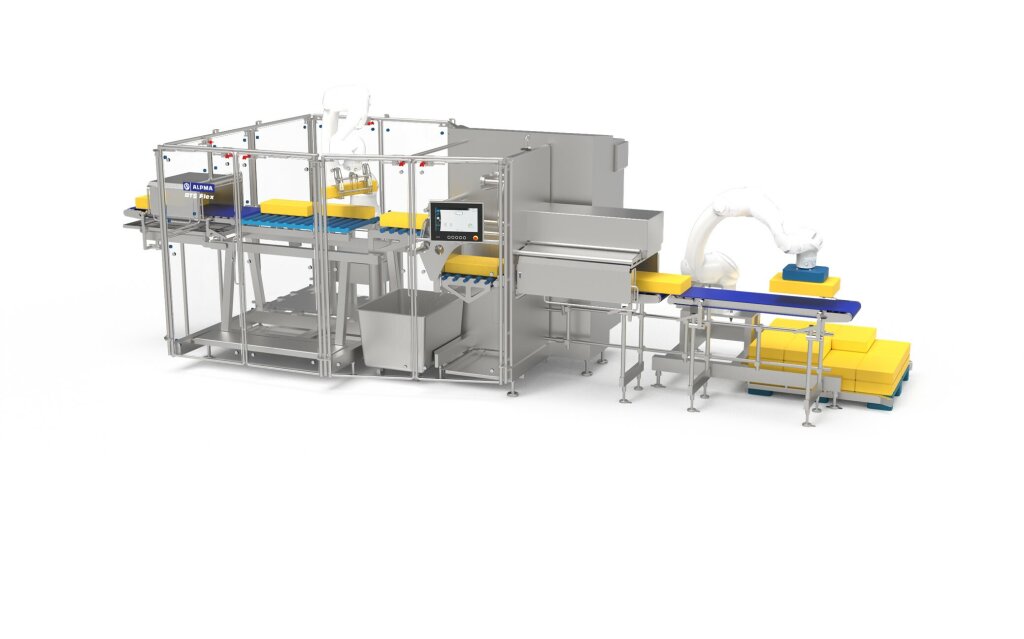 Industrial BTS Flex system featuring stainless steel construction, robotic arms, and conveyor belts for the intelligent portioning of cheese blocks.