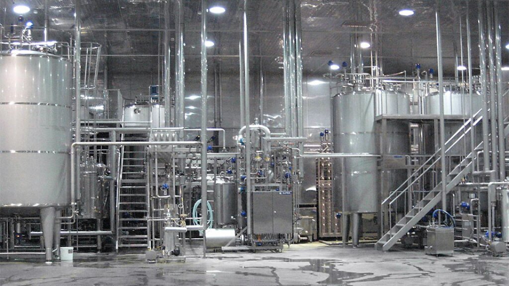 Industrial ALPMA plant for the production of yogurt and fermented milk products, featuring stainless steel vessels, piping, and process technology.